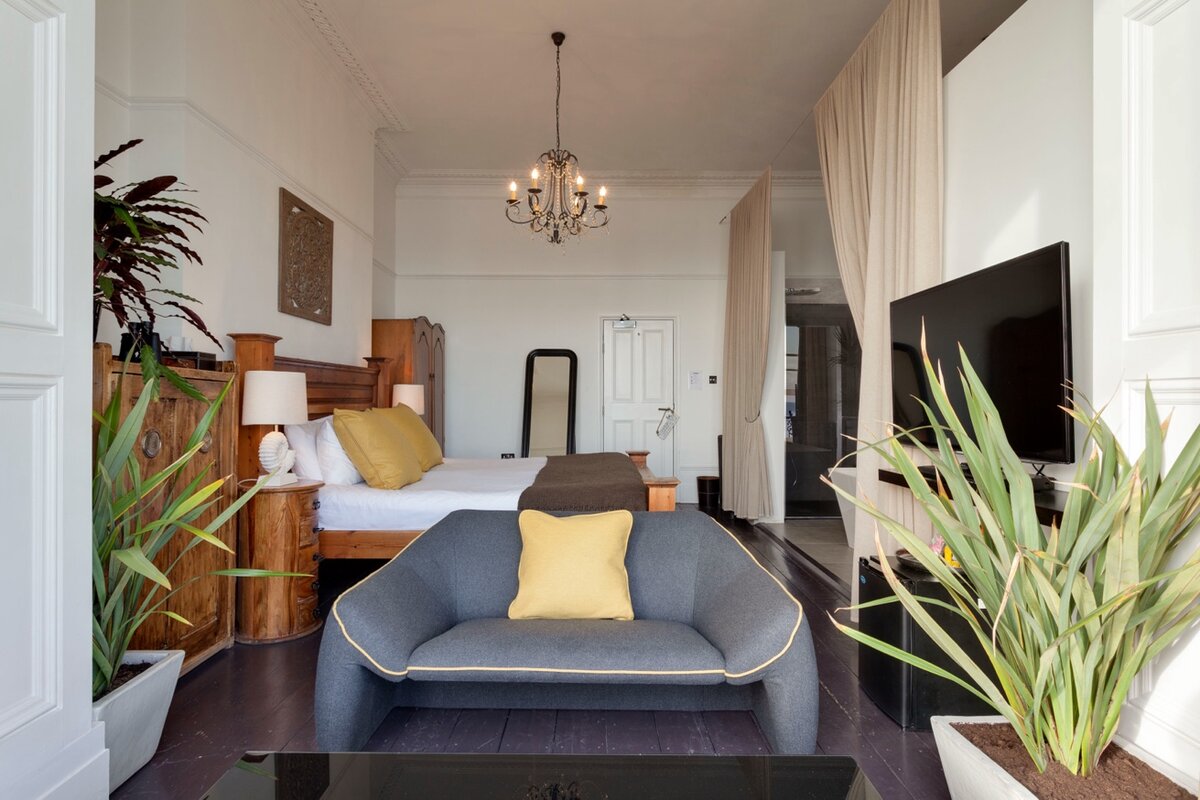 South America Room — spacious seating area and king bed