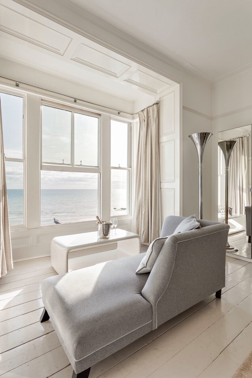 Antarctica Room — chaise longue with panoramic sea view and champagne