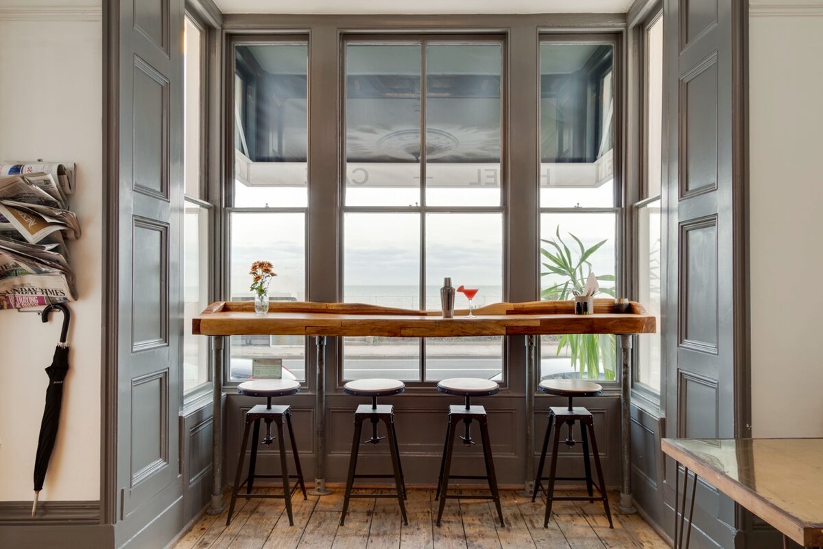 Zanzibar House cocktail bar with sea view and bar stools