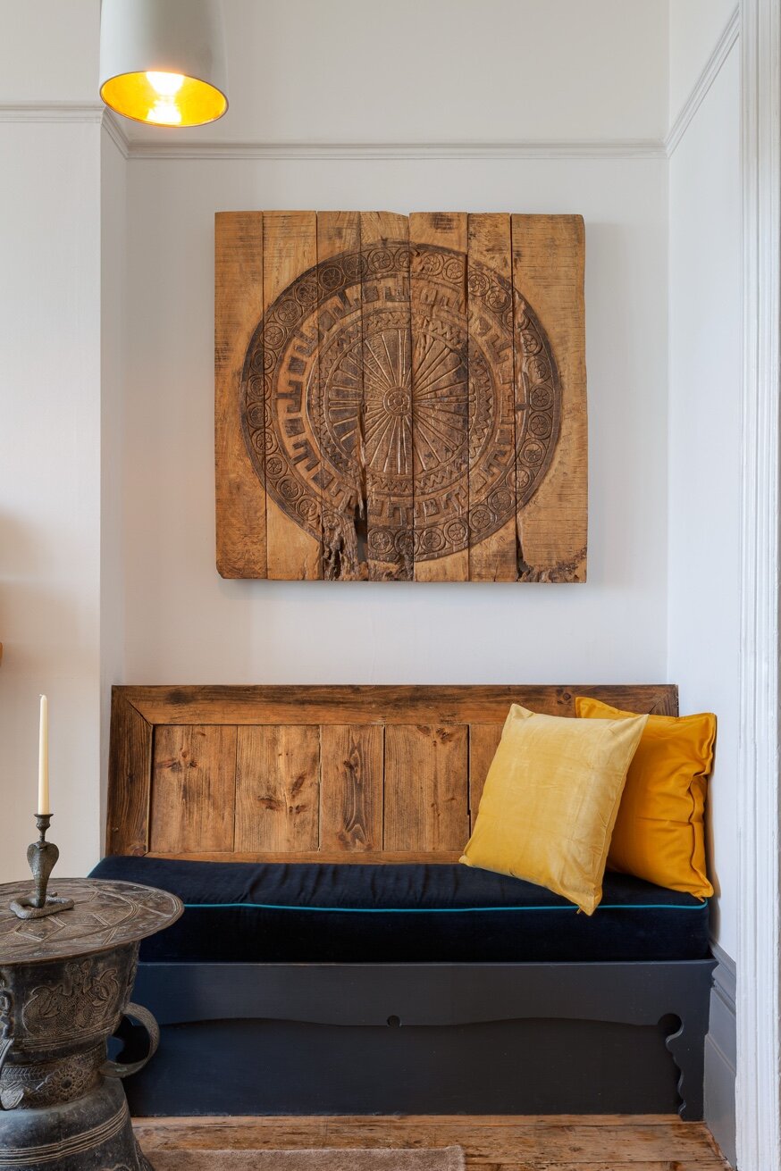 Zanzibar House lounge with Zanzibar Hotel sign, bar and chandelier